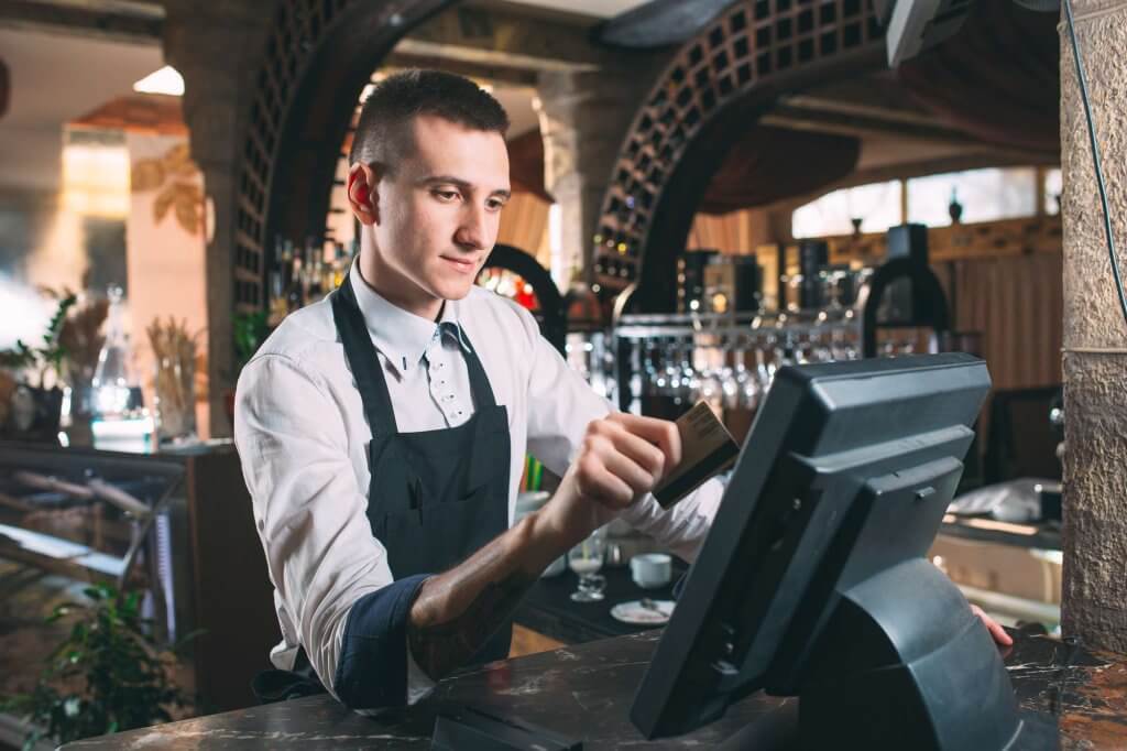 small business people service concept happy man waiter apron counter with cashbox working bar coffee shop